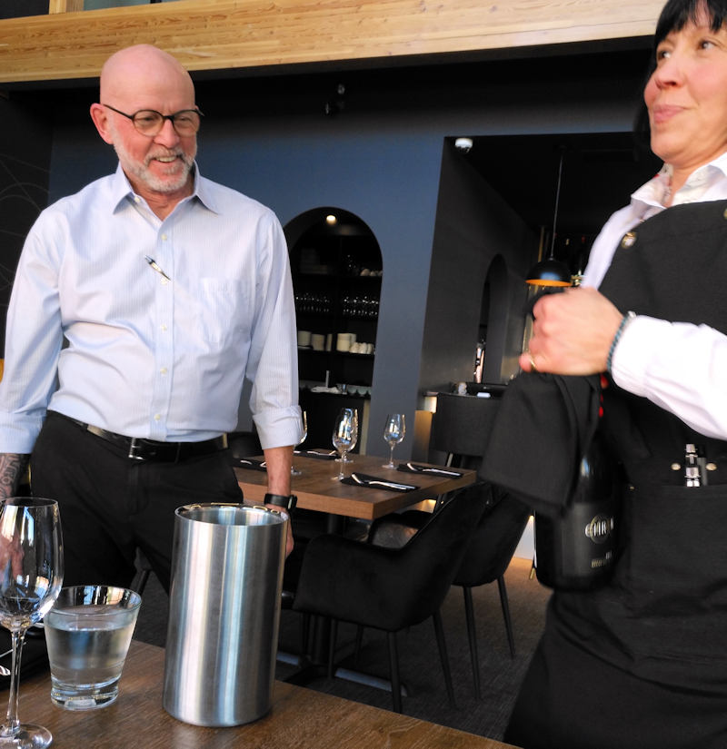 Tom - Rose trying to open the Sparkling wine