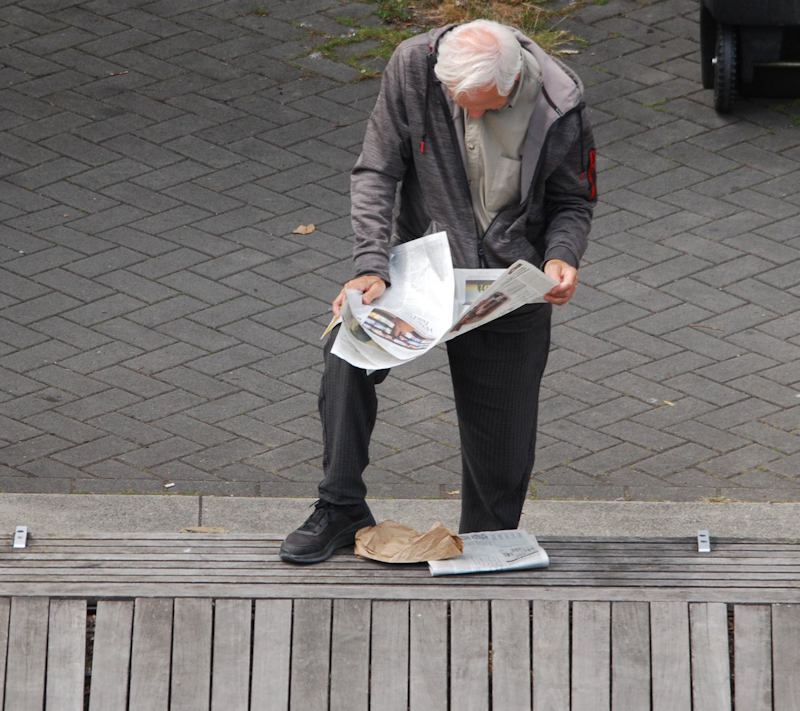Some still reads a Paper  photo by Robert A Bell